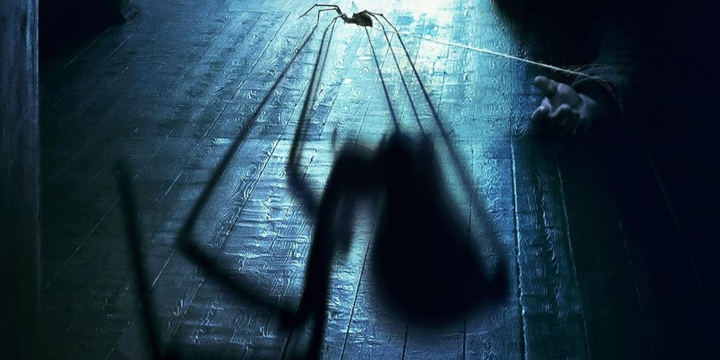 A spider crawling with its large shadow looming, on the poster for the movie Sting.
