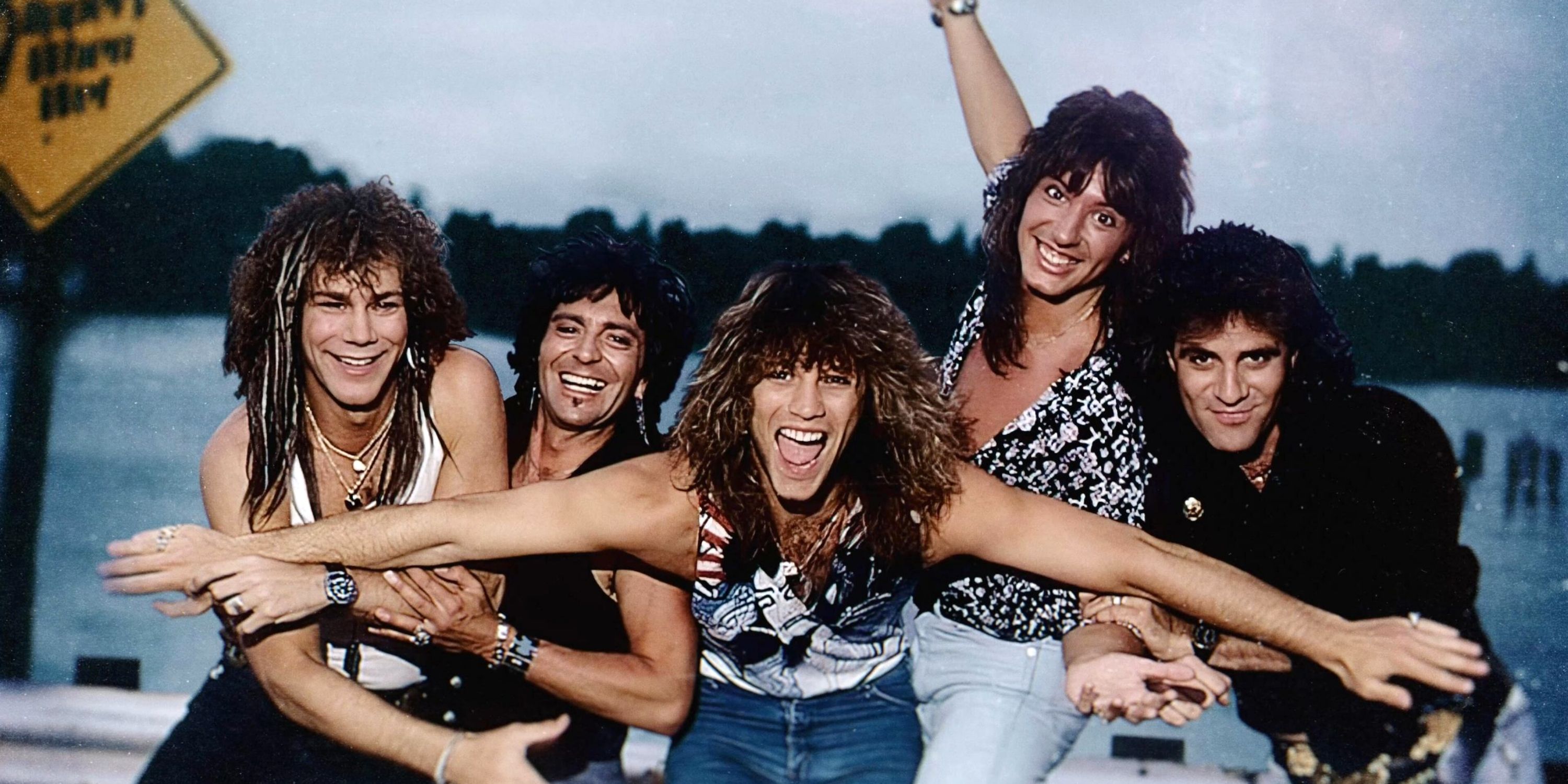 Bon Jovi in a retro promo photo with Jon Bon Jovi in the middle with his arms out for the doc Thank You, Goodnight
