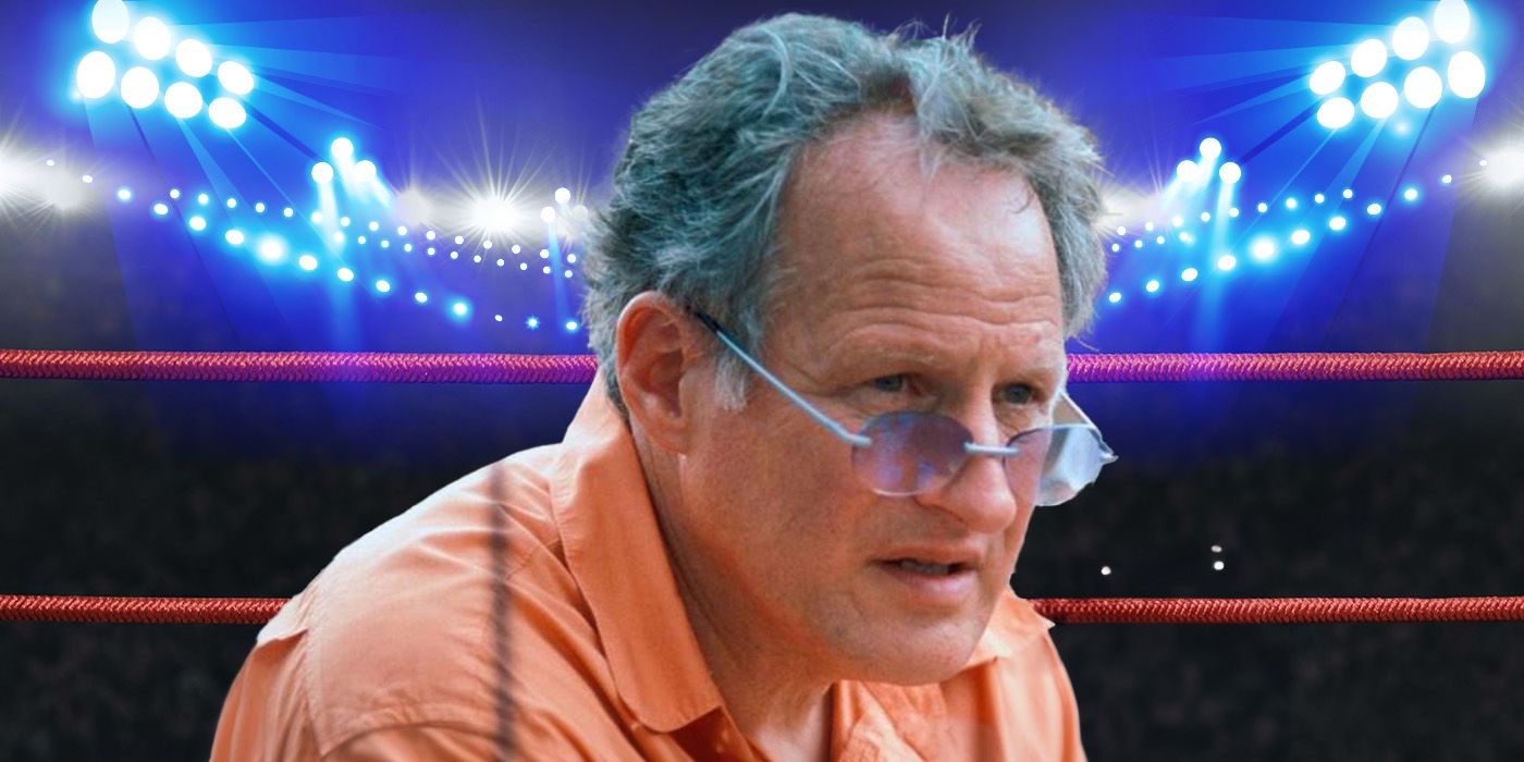 Michael Mann looking contemplative in front of a boxing ring background