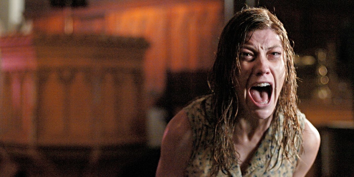 Jennifer Carpenter as Emily Rose, screaming in a chapel in The Exorcism of Emily Rose