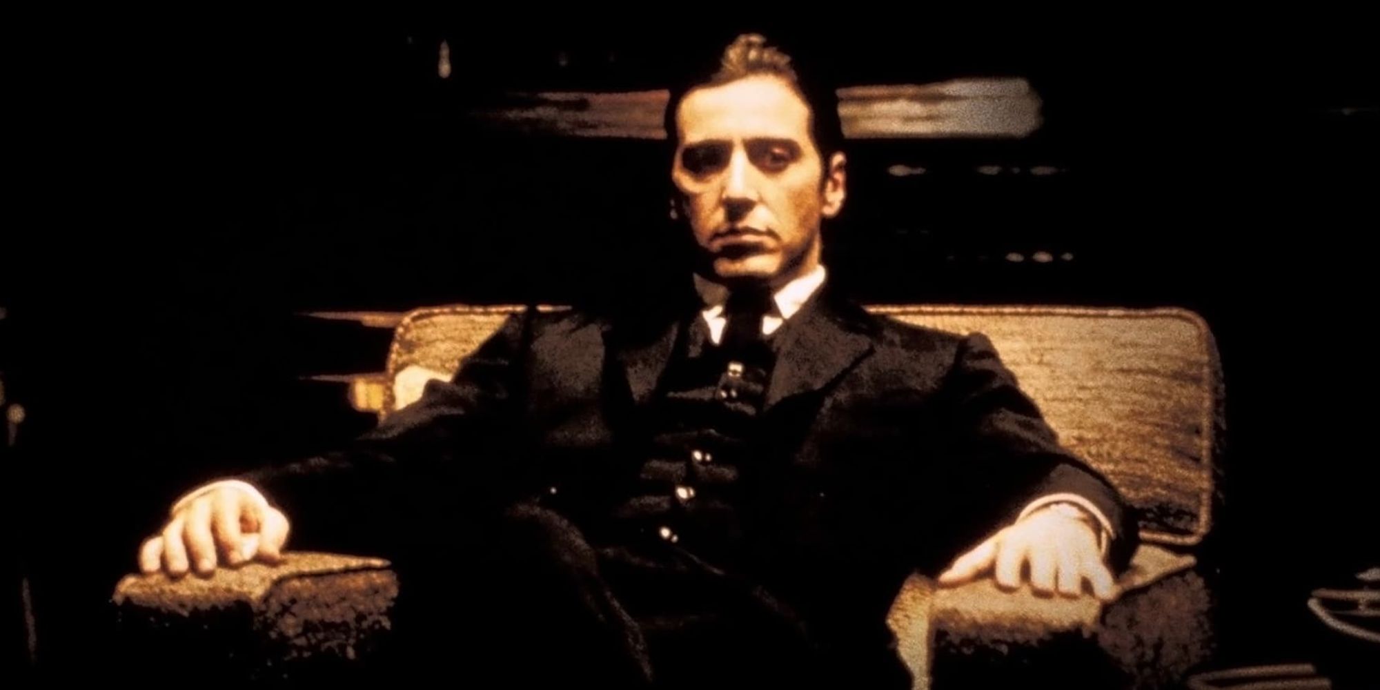 Al Pacino sits in the chair in The Godfather: Part II 