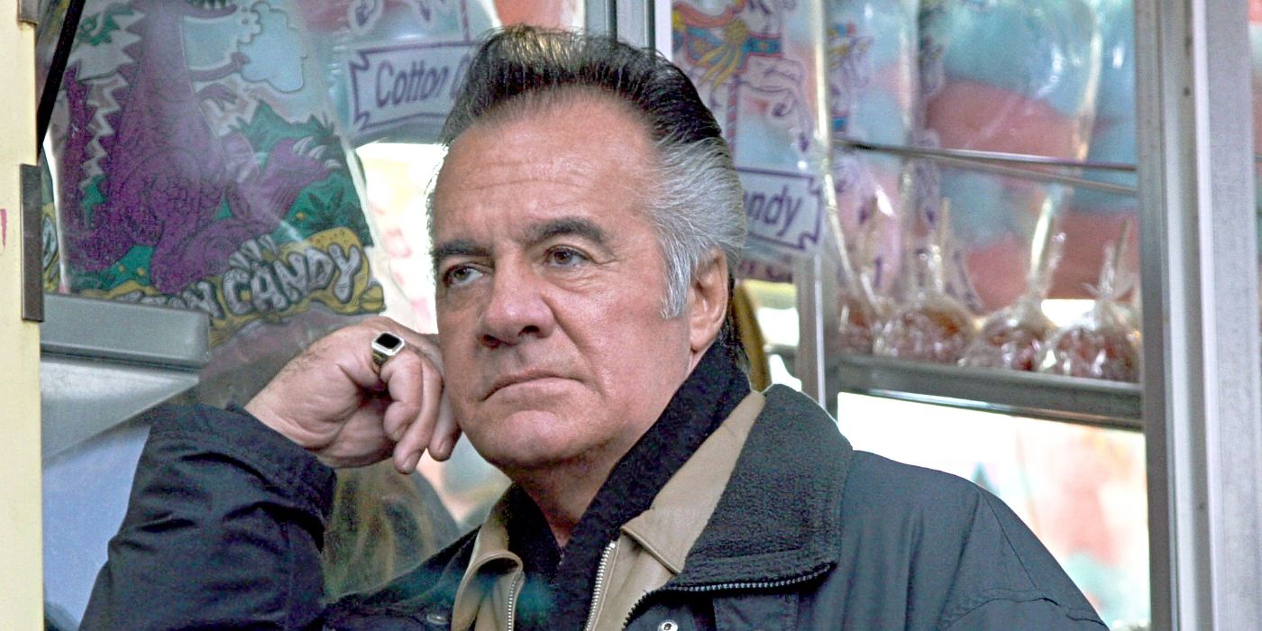 Tony Sirico as Paulie Gualtieri, leaning against a wall in The Sopranos