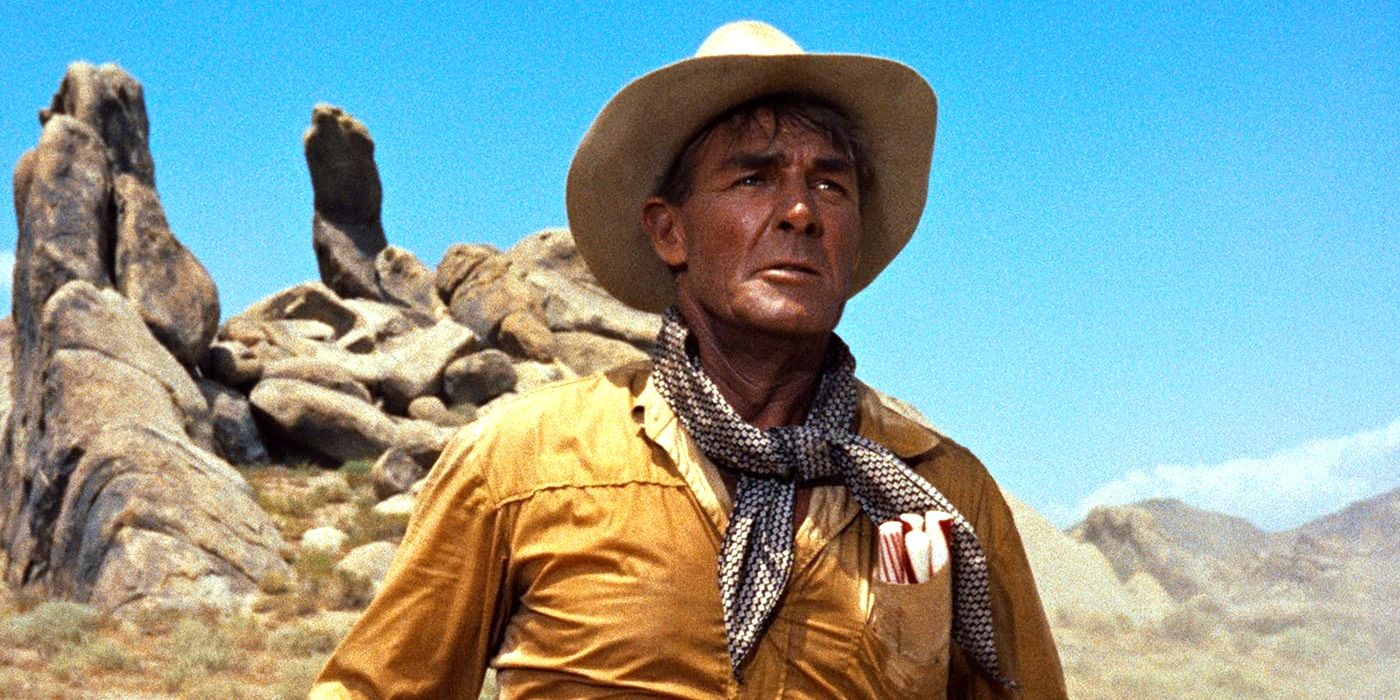 Randolph Scott as Pat Brennan standing in the open desert in 'The Tall T'