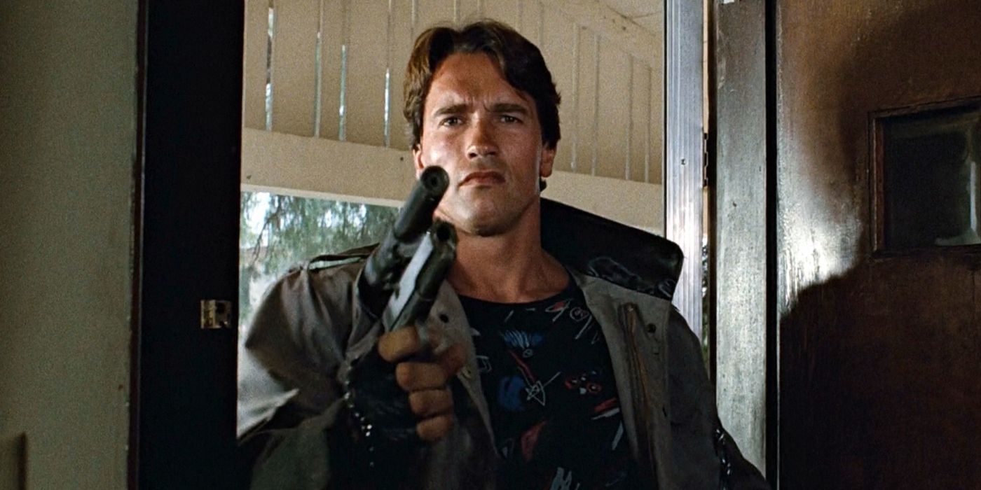 Arnold Schwarzenegger holding a gun in The Terminator 