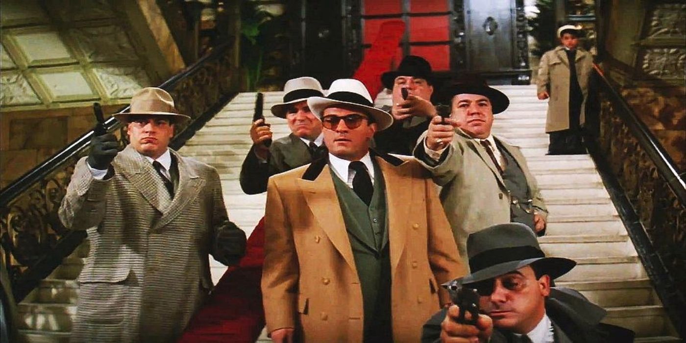 Al Capone and his followers aiming their guns at someone off-camera in The Untouchables