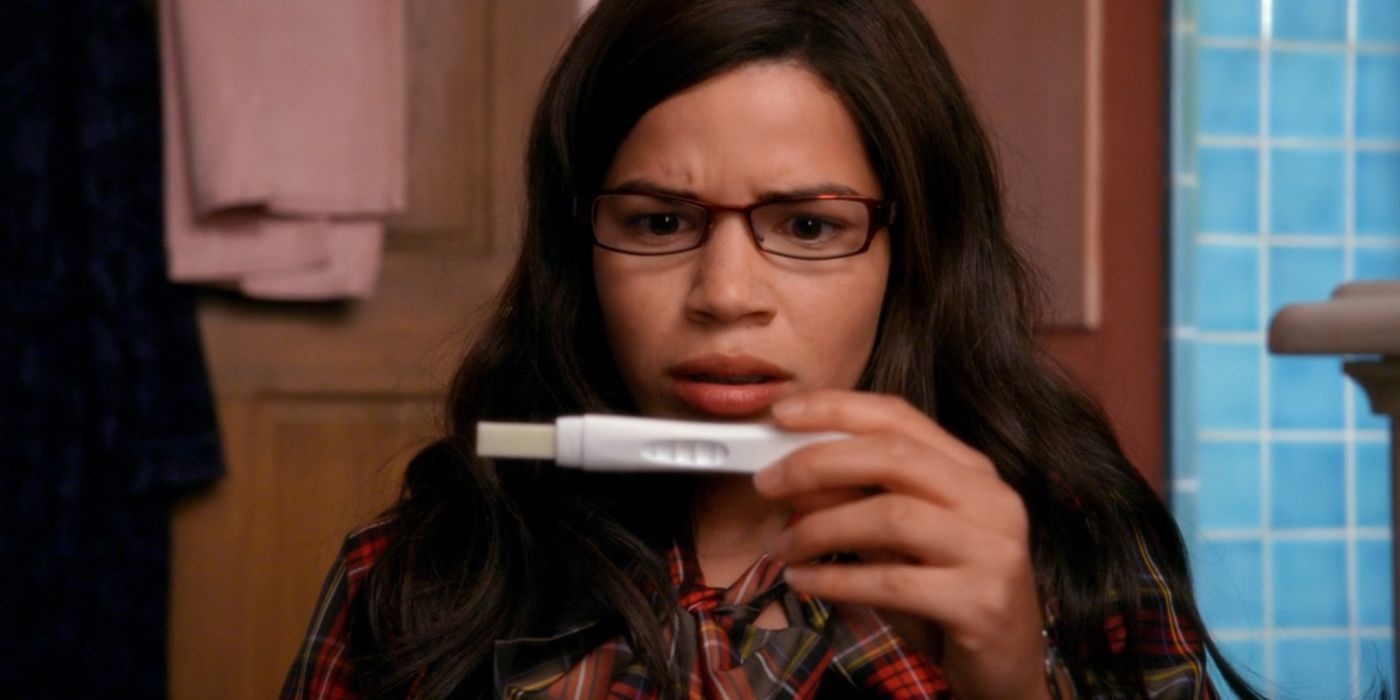 Betty looks at the results of her pregnancy test.
