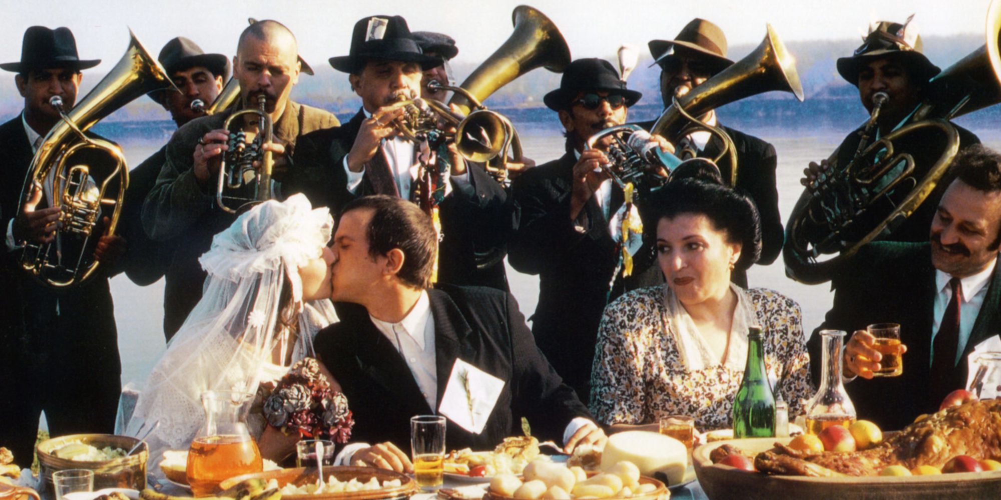 A group of men at a wedding on an island in Underground (1995)