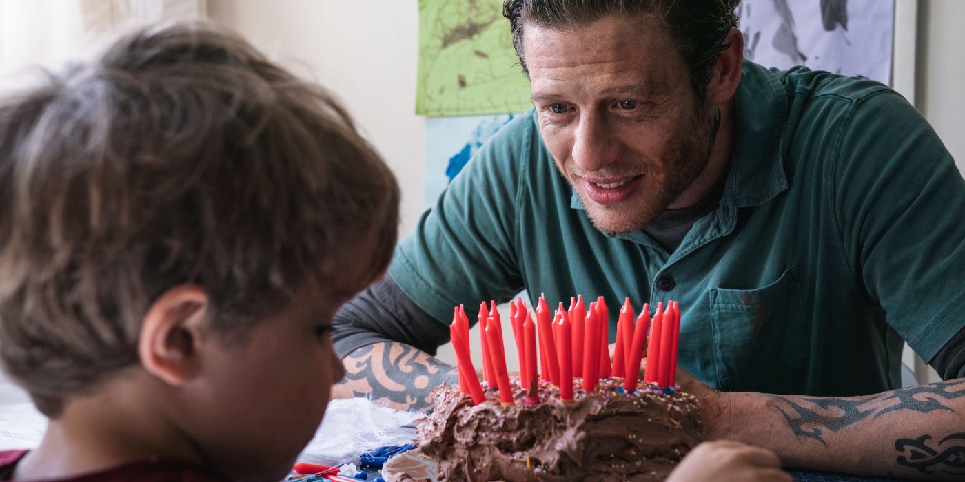 James Norton and Daniel Lamont as father and son with a birthday cake in Nowhere Special.