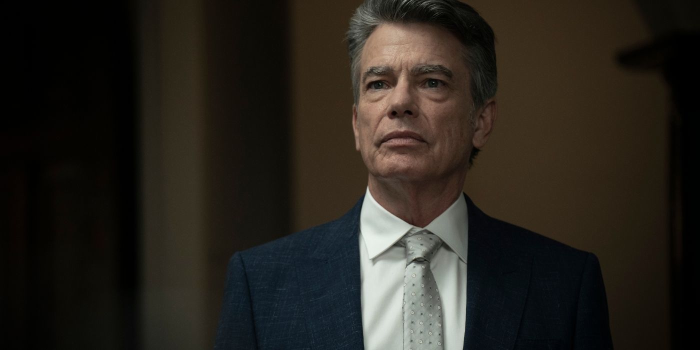 Peter Gallagher in a suit and tie in Humane