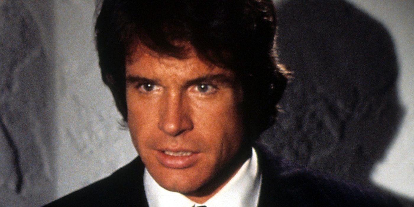 Warren Beatty as Joe Pendleton in a suit looking straight ahead in Heaven Can Wait