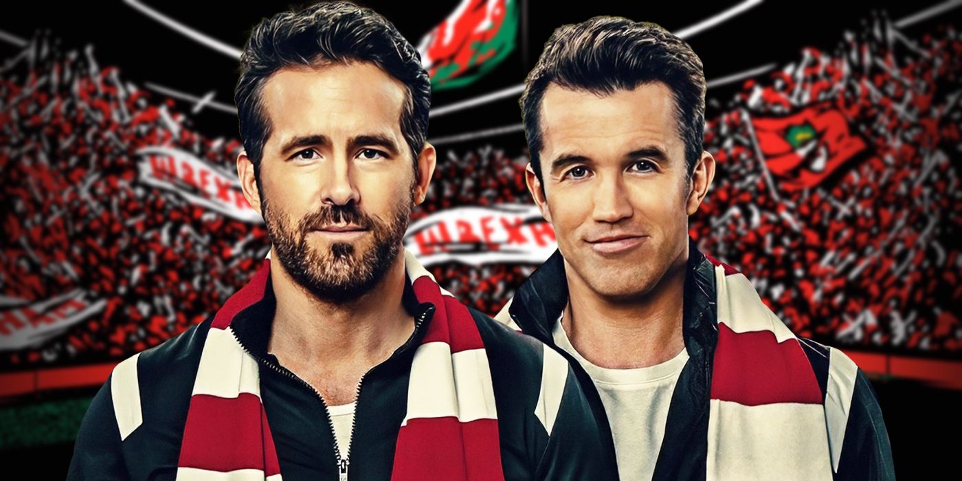 Ryan Reynolds and Rob McElhenney smiling in front of a backdrop of Wrexham fans cheering in a stadium