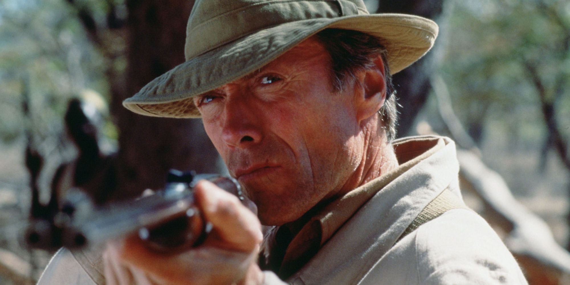 Clint Eastwood pointing a rifle in &lsquo;White Hunter Black Heart&rsquo;