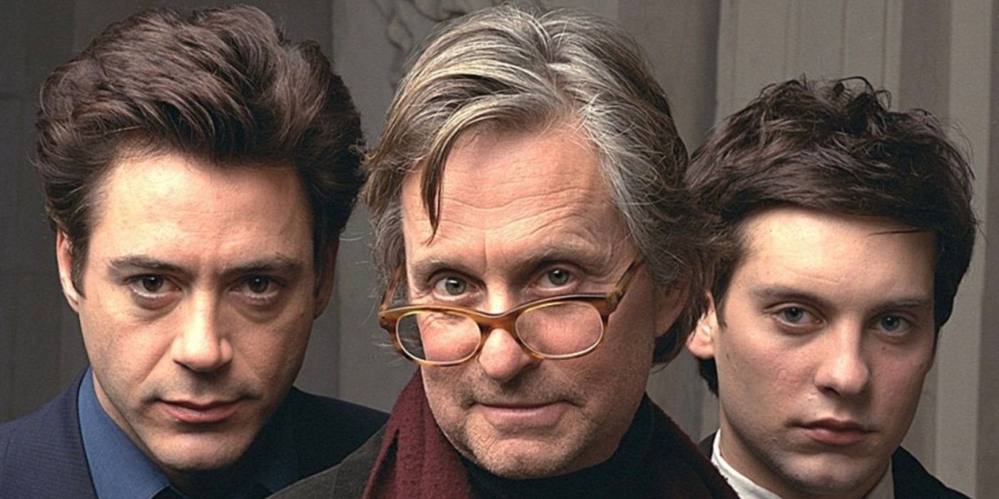 Michael Douglas, Robert Downey Jr., and Tobey Maguire looking straight at the camera in Wonder Boys promo