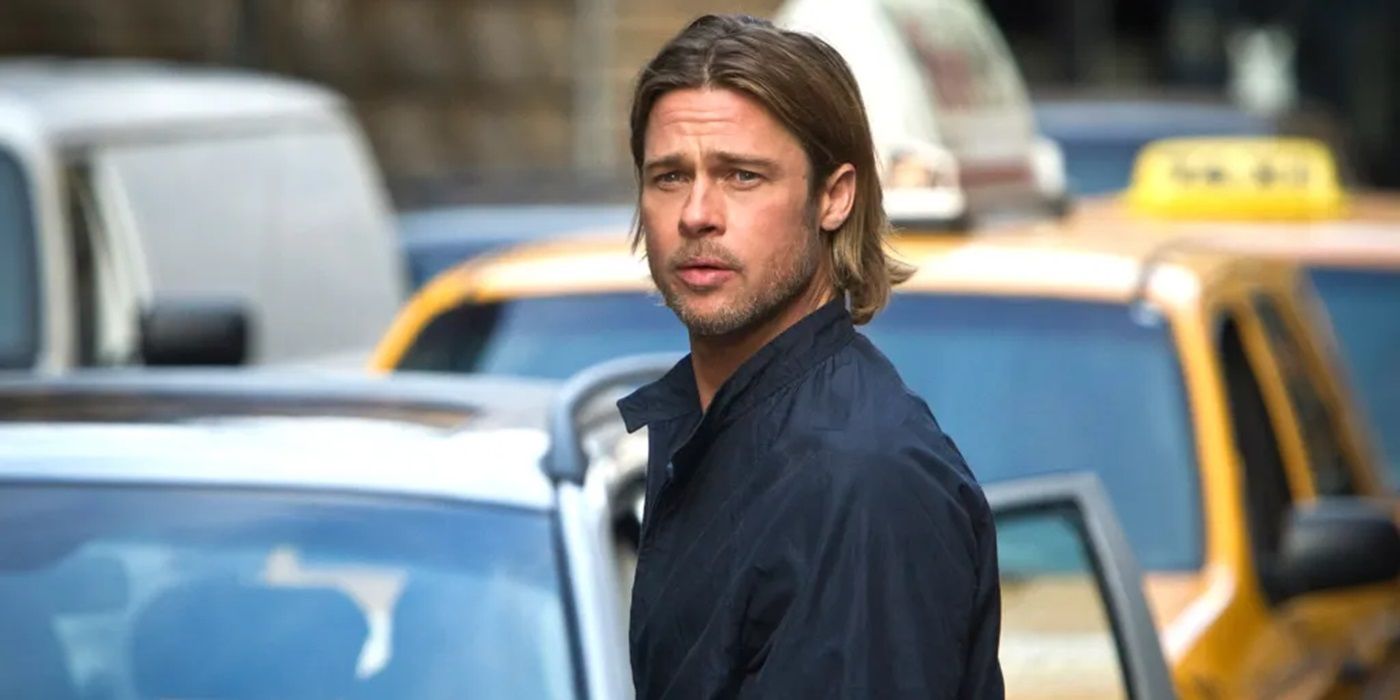 Brad Pitt stars as Gerry Lane, standing in traffic, in World War Z