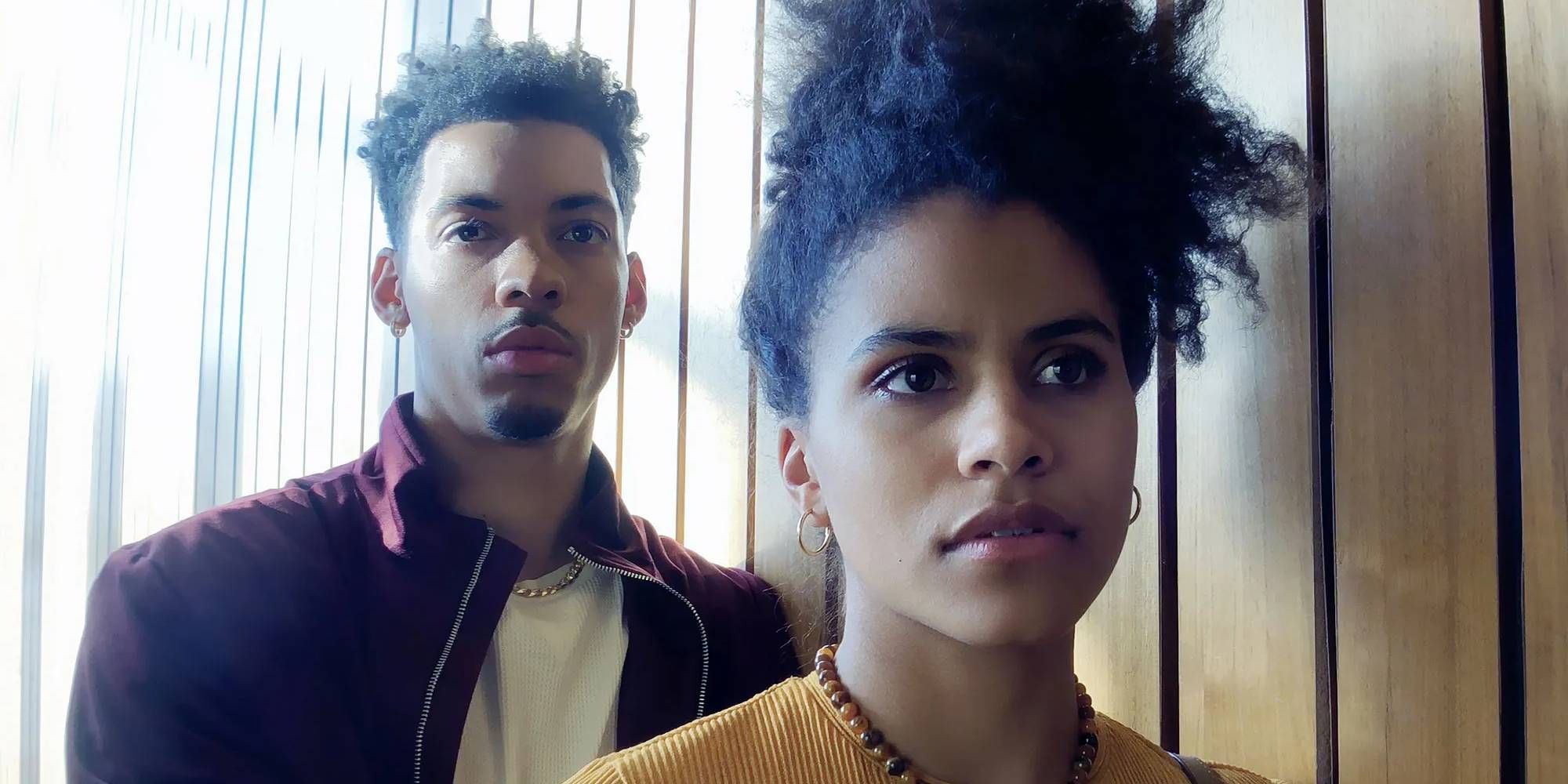 Zazie Beetz in High Flying Bird looking at something or someone off-camera.