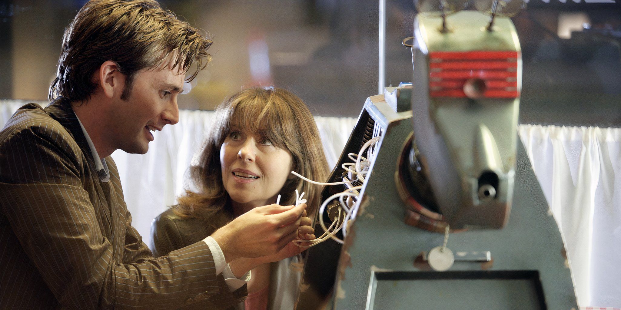 10th Doctor and Sarah Jane fixing K9 in 'School Reunion' from 'Doctor Who'