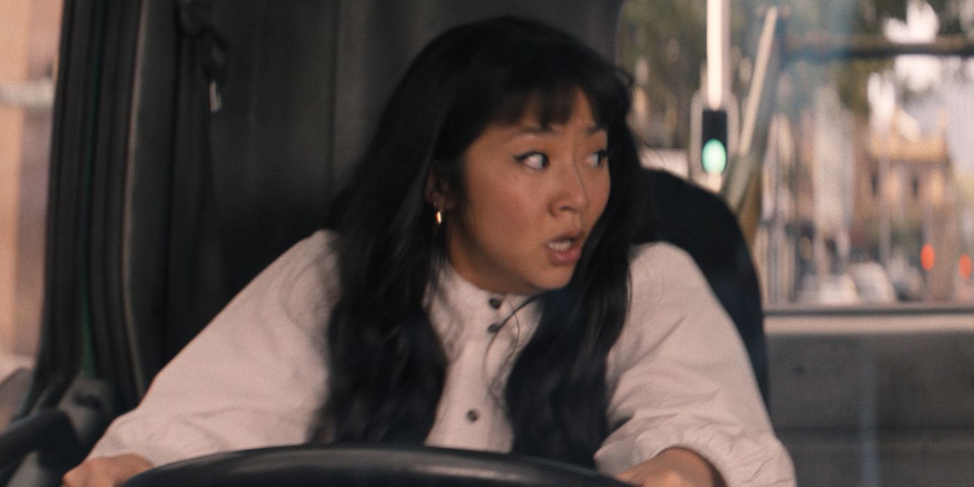 Stephanie Hsu looking panicked while driving a truck in The Fall Guy.