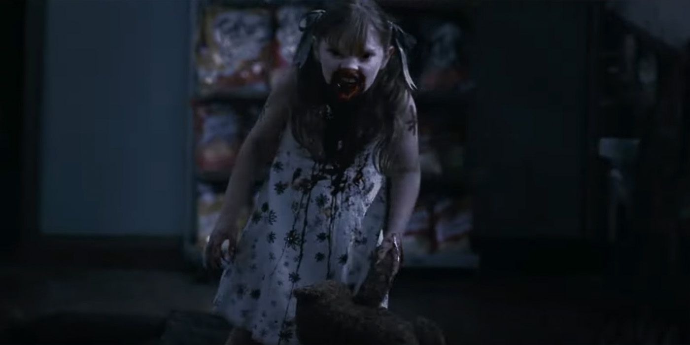 The vampire girl (played by Abbey-May Wakefield) with her teddy bear in '30 Days of Night'.