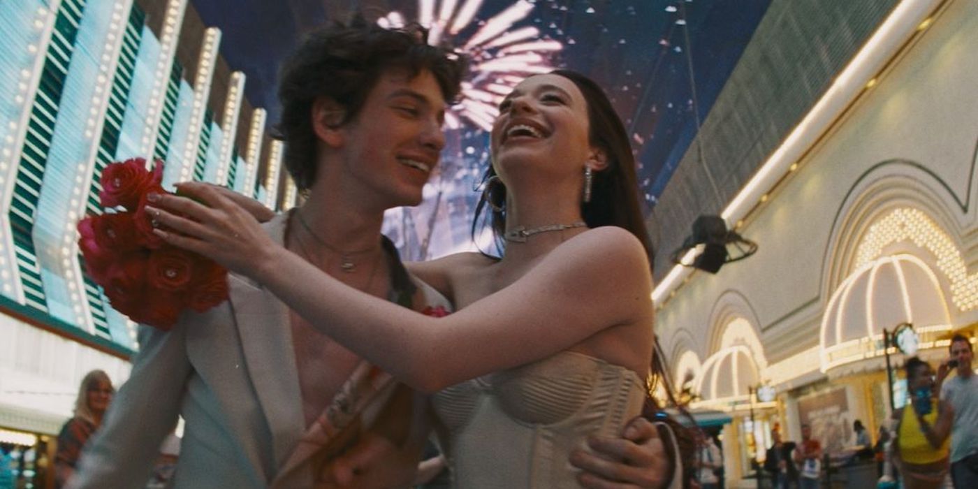 Mikey Madison as Ani and Mark Eydelshteyn as Ivan celebrating their wedding in Vegas in Anora. 