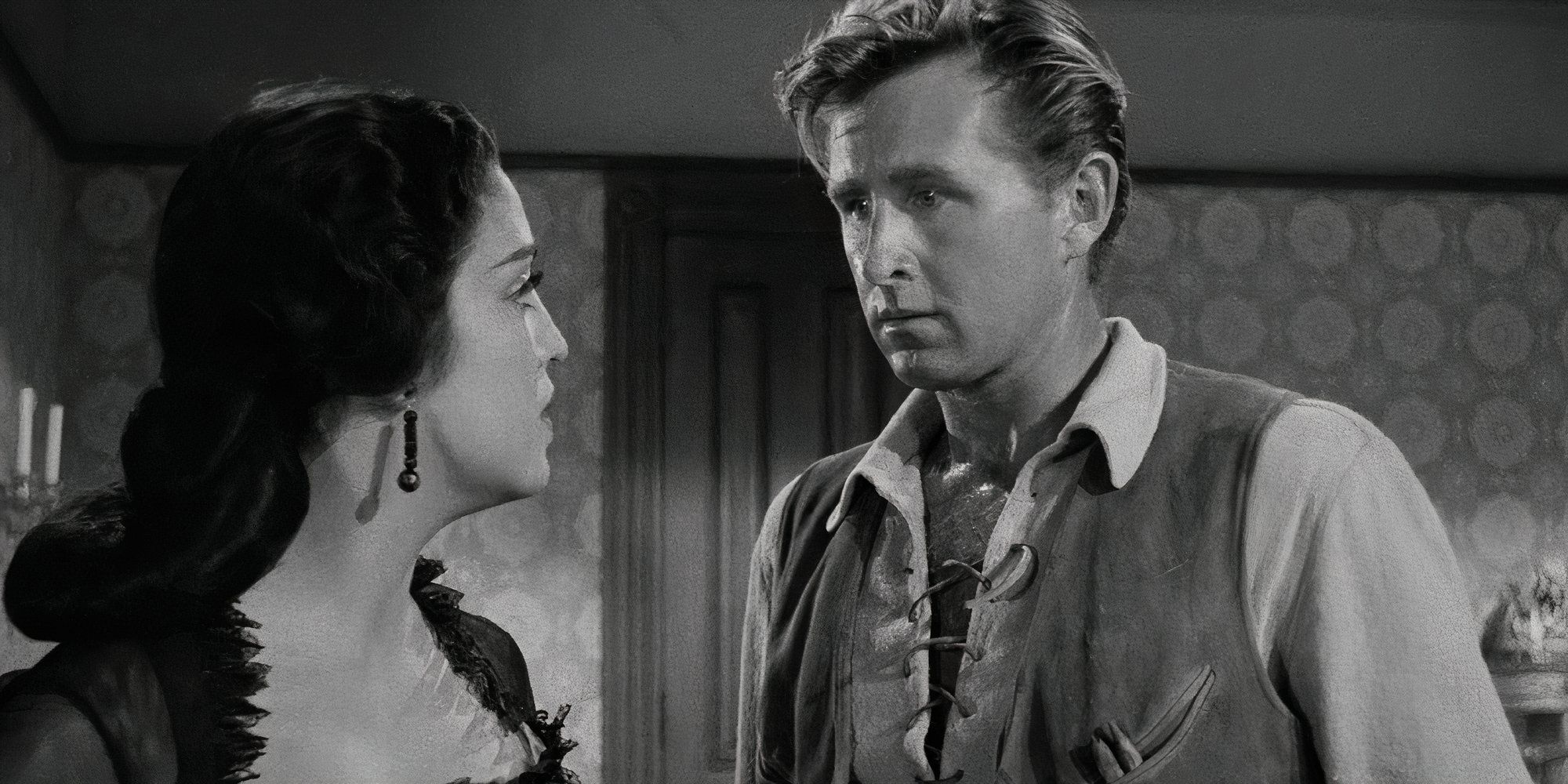 A man looks at Katy Jurado in High Noon