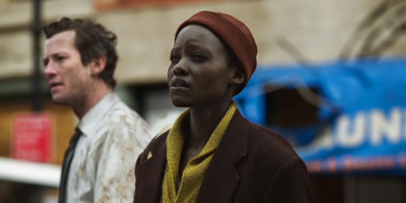 Joseph Quinn and Lupita Nyong'o look despondent in A Quiet Place: Day One