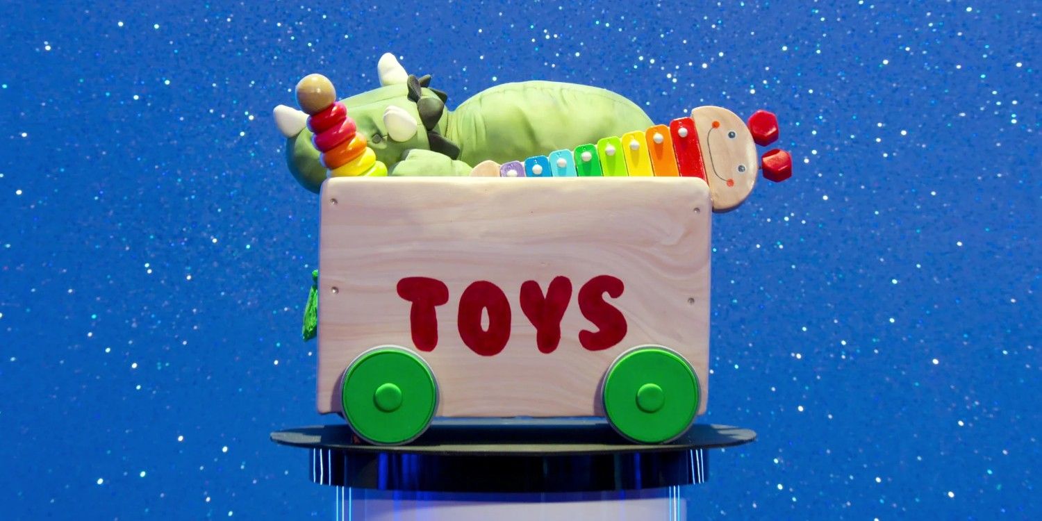 a toy box with different toys poking out - all made of cake - sits on a podium on Netflix's Is It Cake