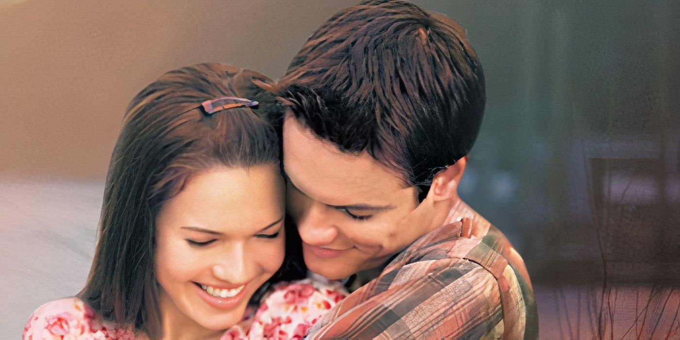 Mandy Moore and Shane West snuggling on the poster for A Walk To Remember