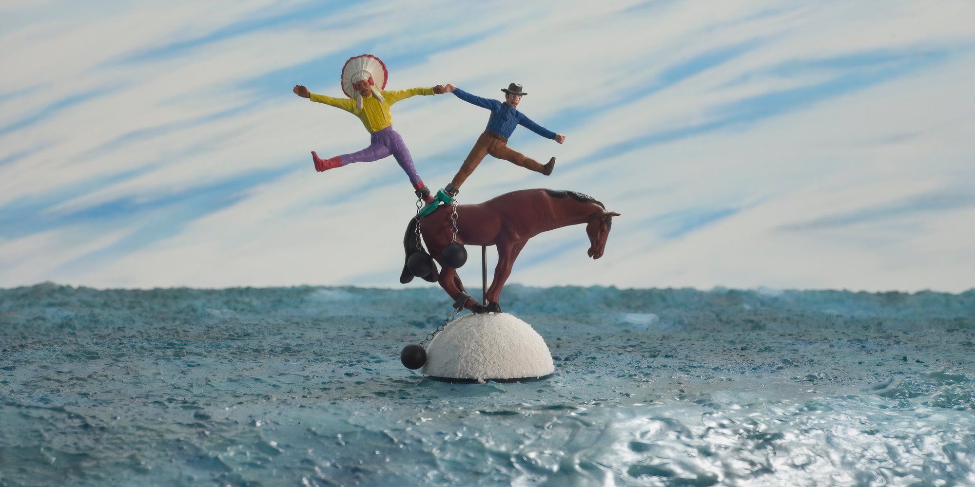 Cowboy, Indian, and Horse standing on a snowball in the middle of the ocean in 'A Town Called Panic' (2009)