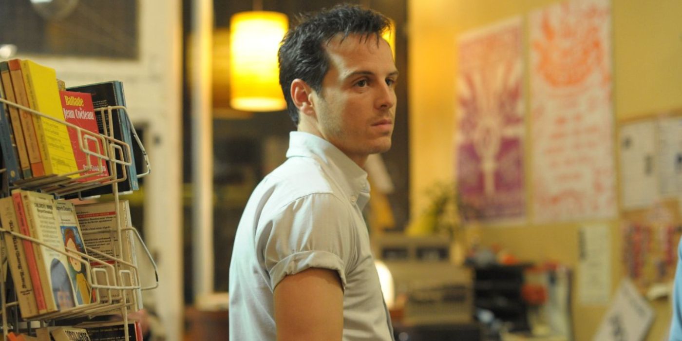 Gethin stands in a store wearing a t-shirt with the sleeves rolled up in 'Pride' (2014).