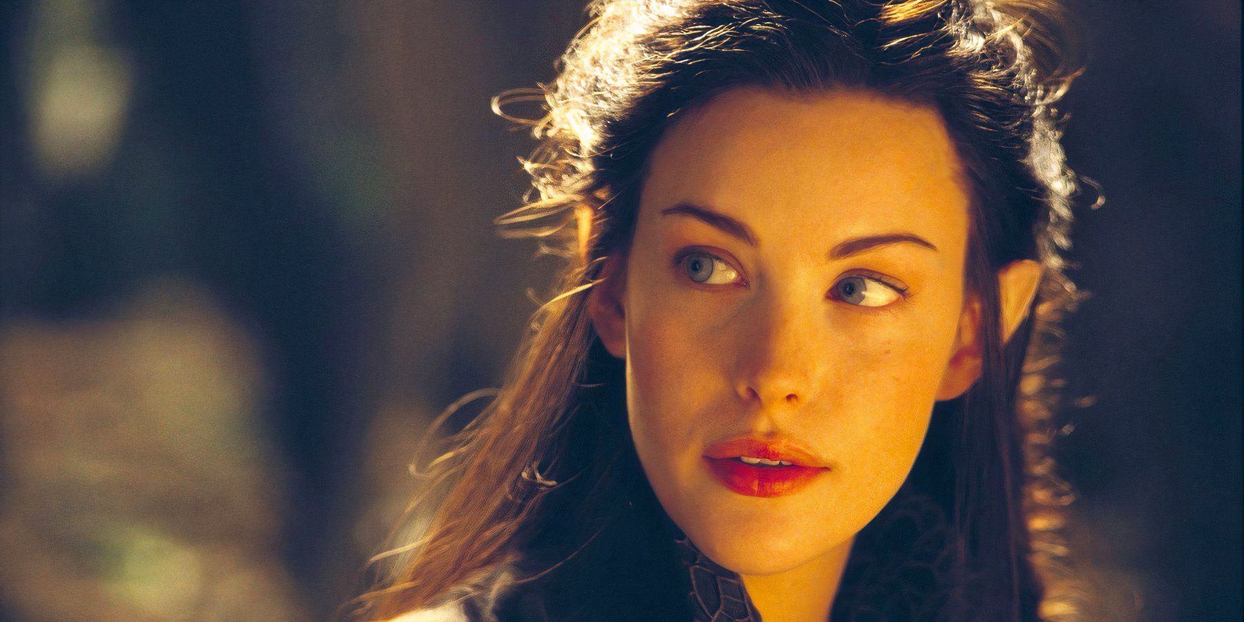 The elf maiden Arwen, played by actor Liv Tyler, looks pensive in The Lord of the Rings: The Fellowship of the Ring.
