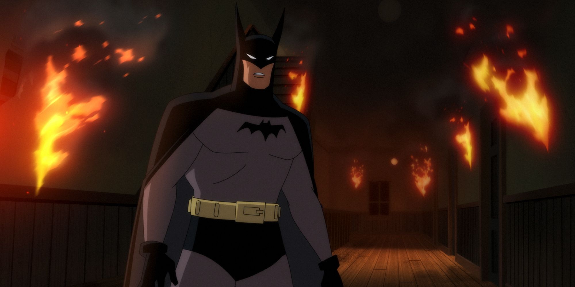 Batman standing in a burning building in Batman: Caped Crusader