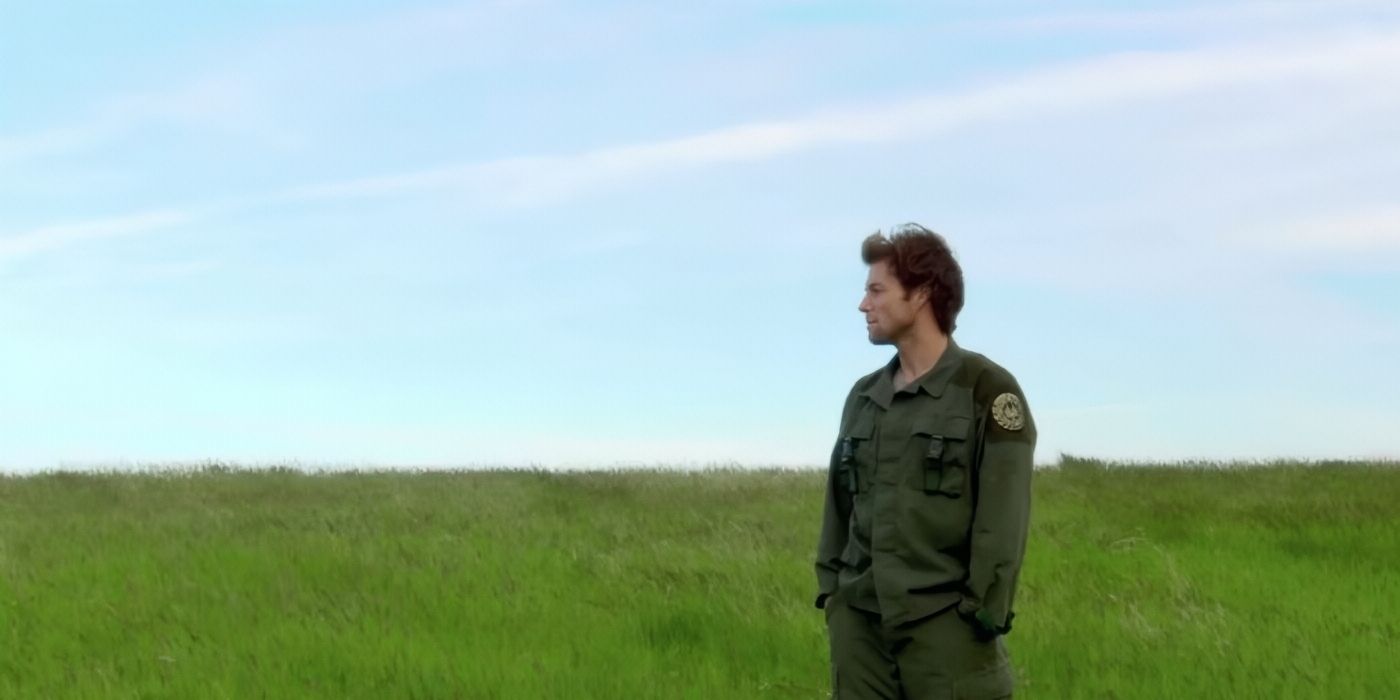 Jamie Bamber as Apollo looking across an open field in the Battlestar Galactica finale.