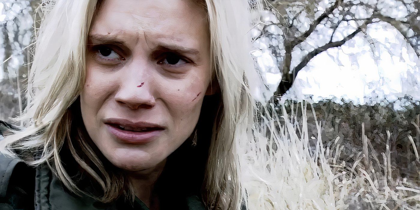 Kara Thrace (Katee Sackhoff) standing in a field looking to the left with a distressed expression in Battlestar Galactica