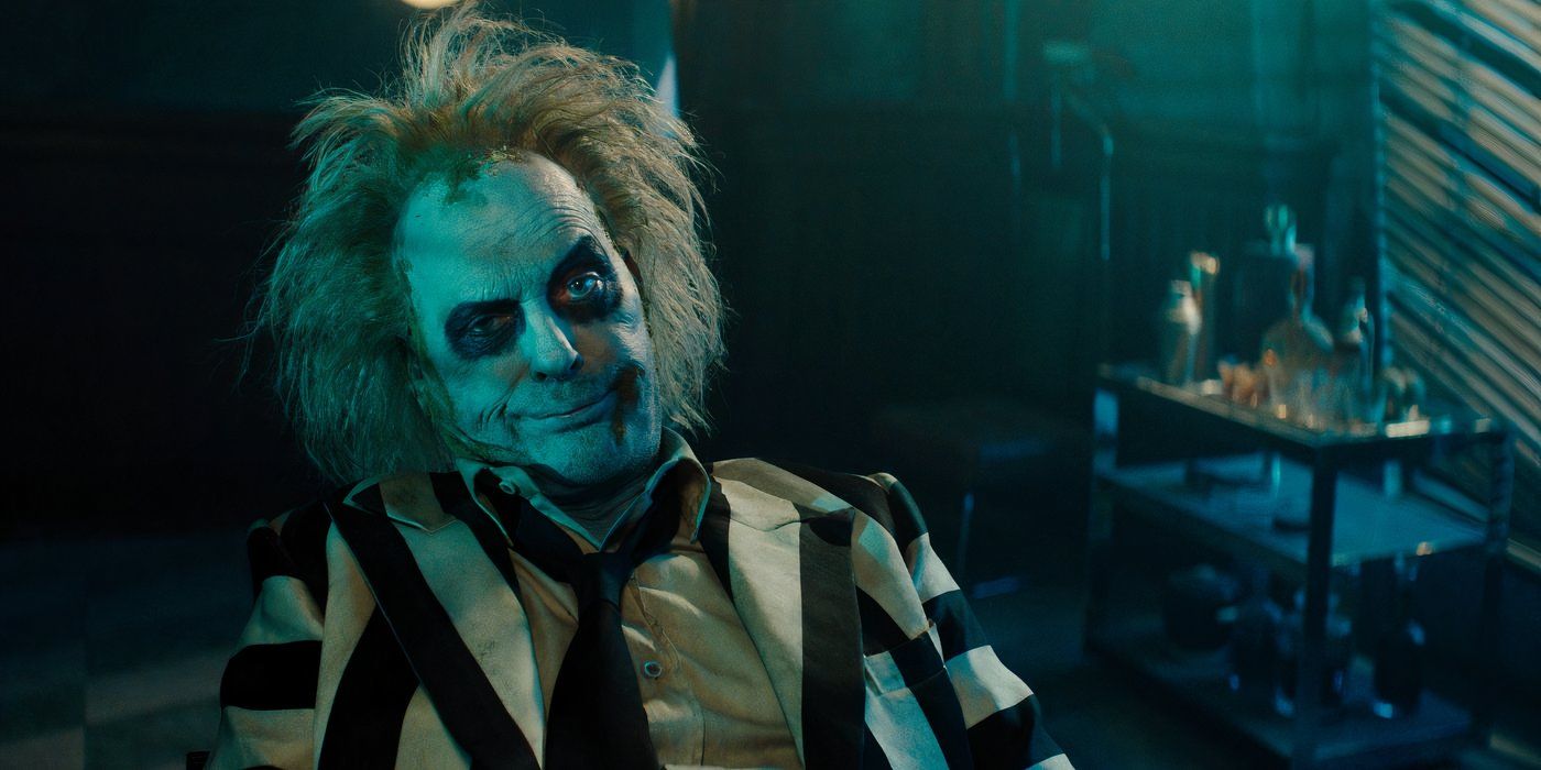 Michael Keaton smirking as Beetlejuice in the sequel Beetlejuice Beetlejuice.