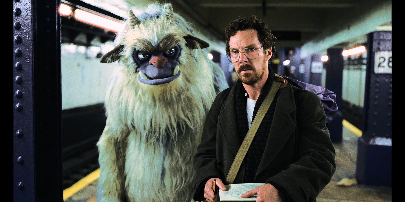 Benedict Cumberbatch wearing glasses, walking down a subway station with a giant furry monster puppet.