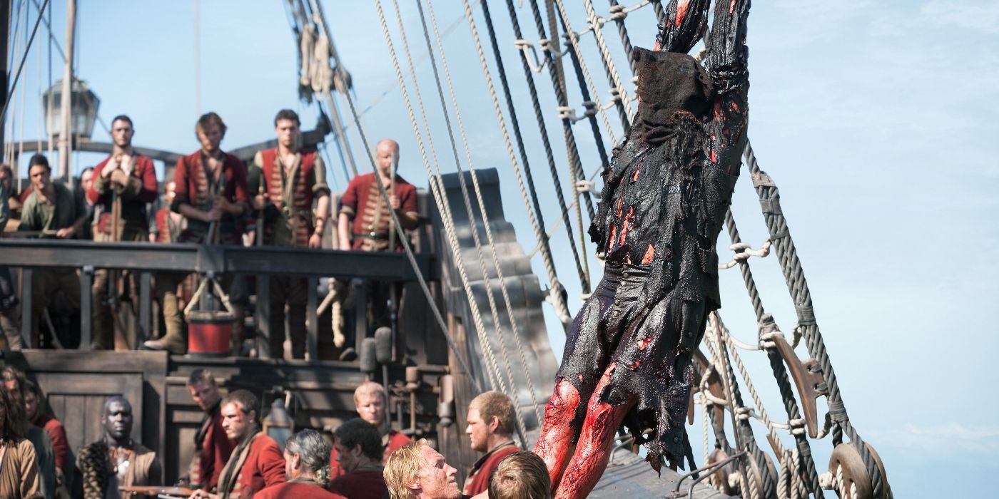 Ray Stevenson as Blackbeard being hoisted on ropes in Black Sails Season 4