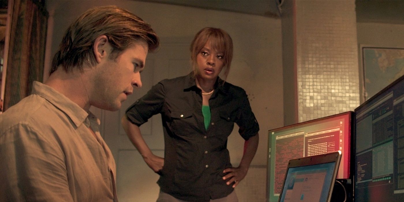 Viola Davis as FBI Special Agent Carol Barrett looking at Chris Hemsworth as Nicholas Hathaway in Blackhat