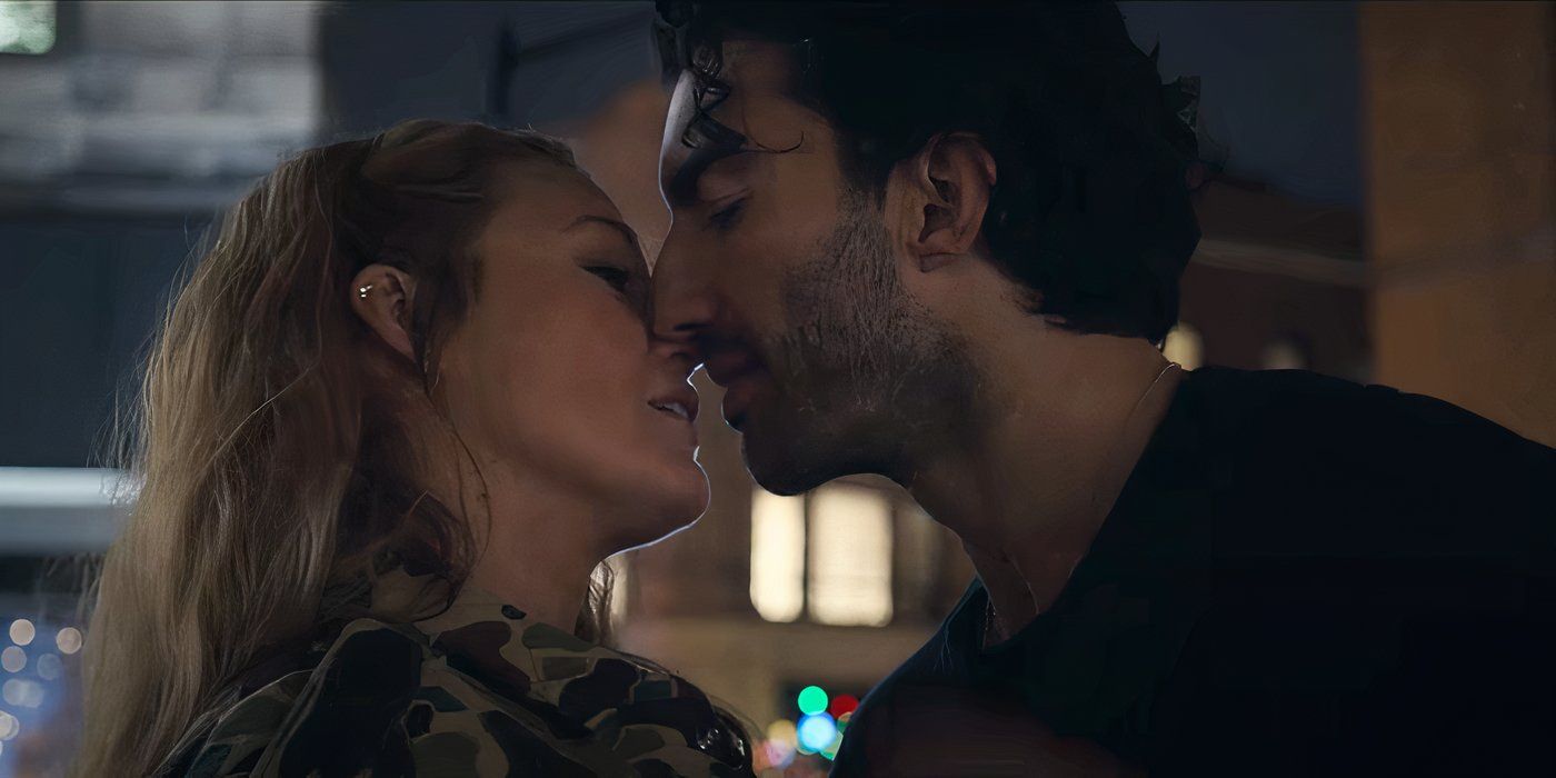 Blake Lively and Justin Baldoni kissing on a rooftop.