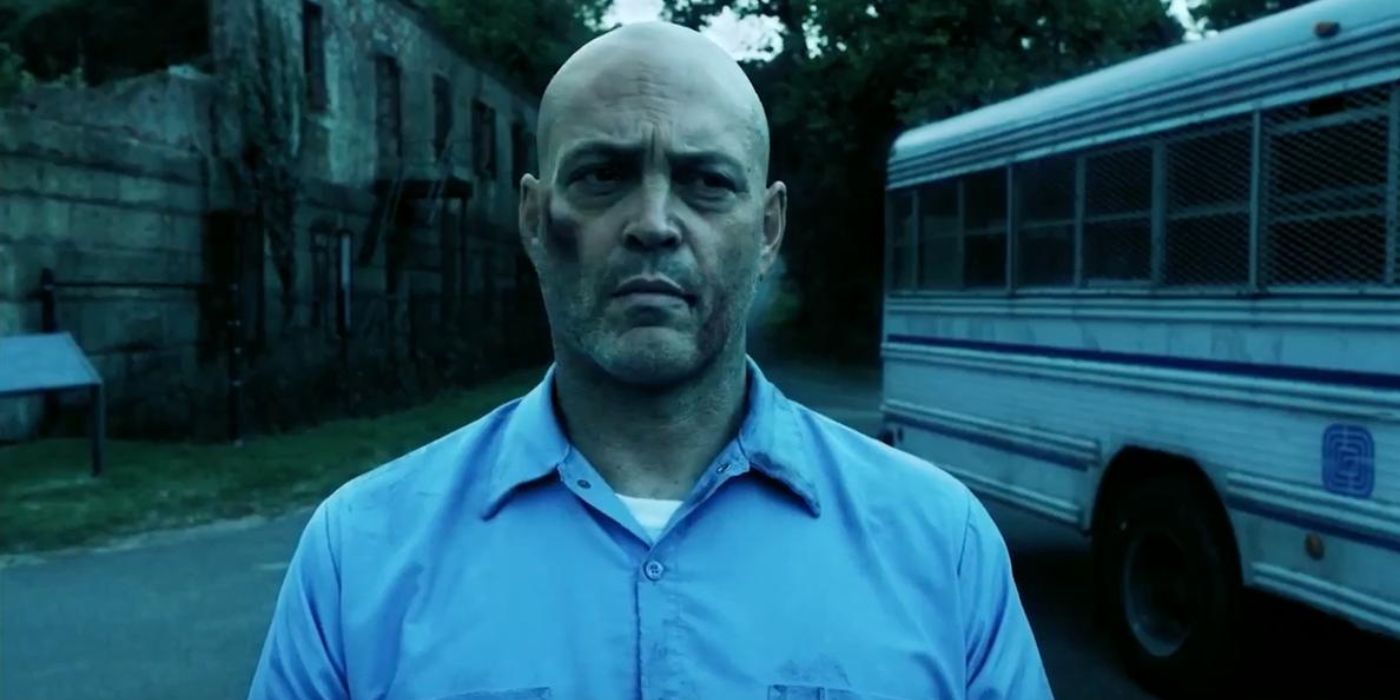 Vince Vaughn standing next to a prison bus in Brawl in Cell Block 99