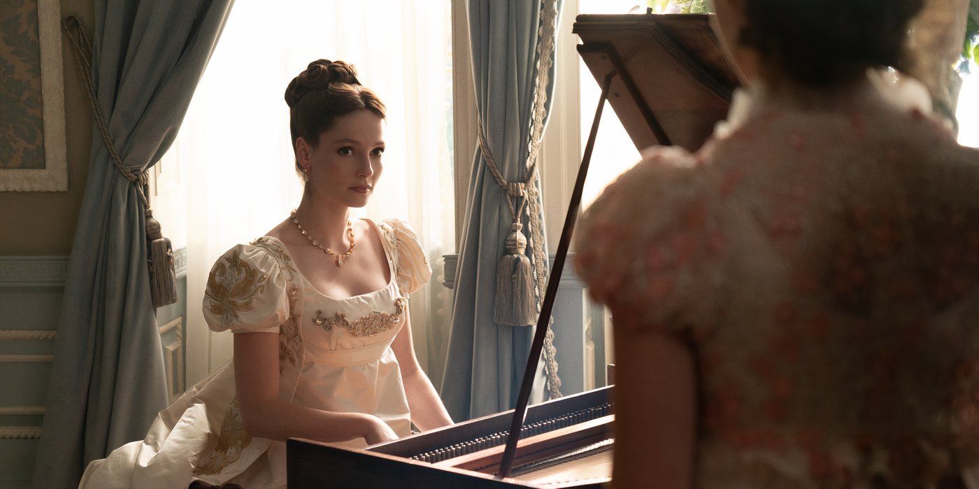 Hannah Dodd as Francesca Bridgerton sitting at a piano in Bridgerton Season 3 Episode 1