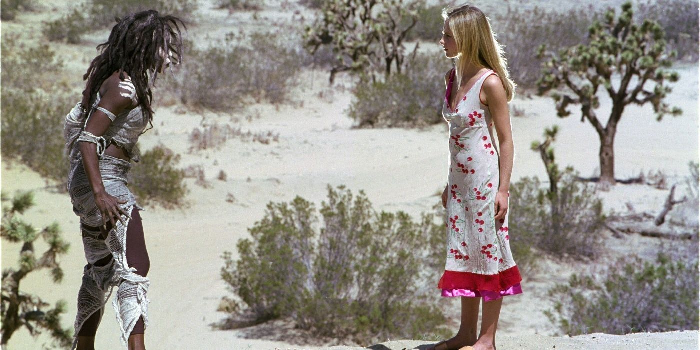 Buffy and the First Slayer standing in the desert facing each other in the Buffy episode Restless