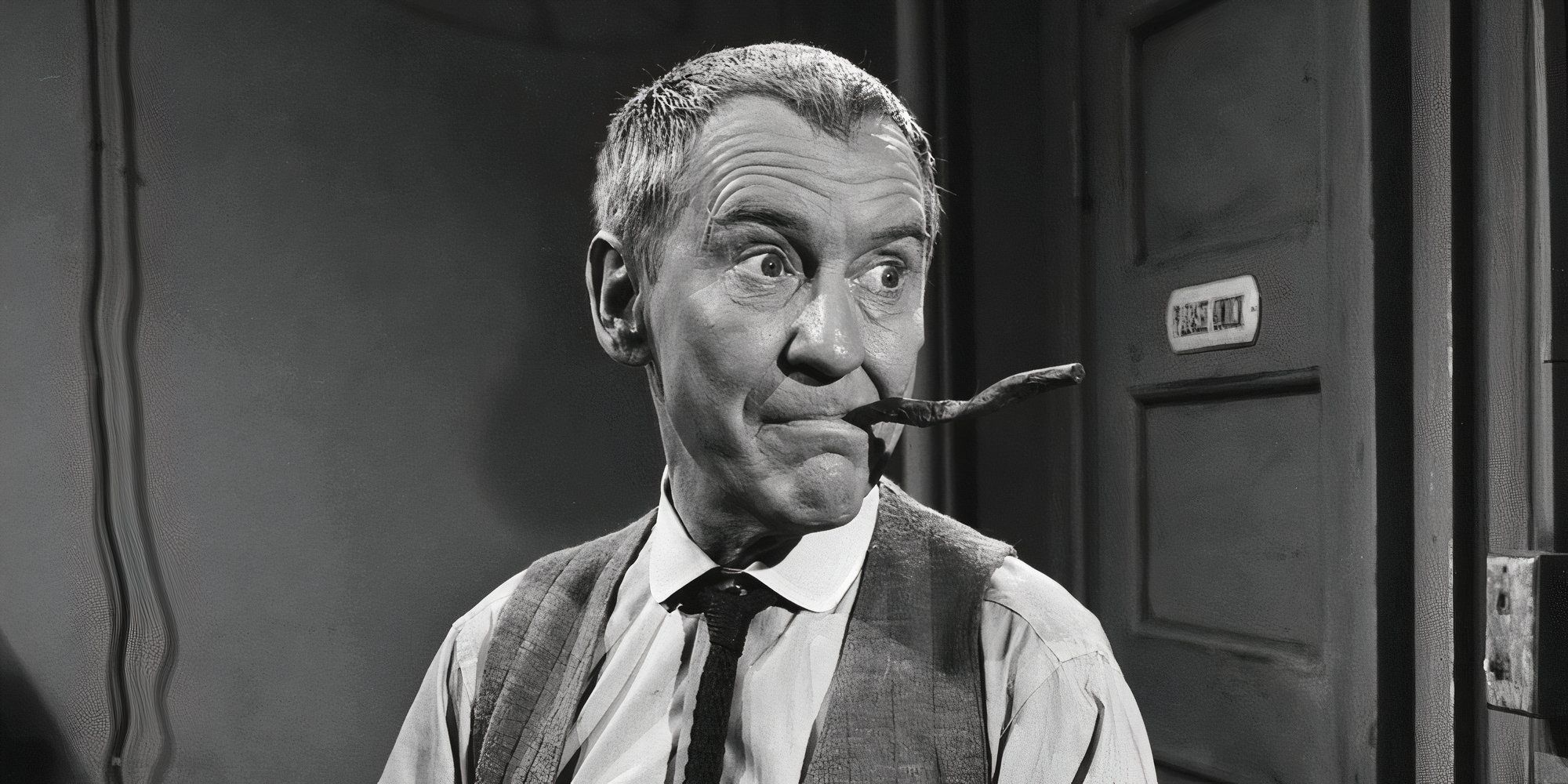 Burgess Meredith standing with a crooked cigar in his mouth in The Twilight Zone