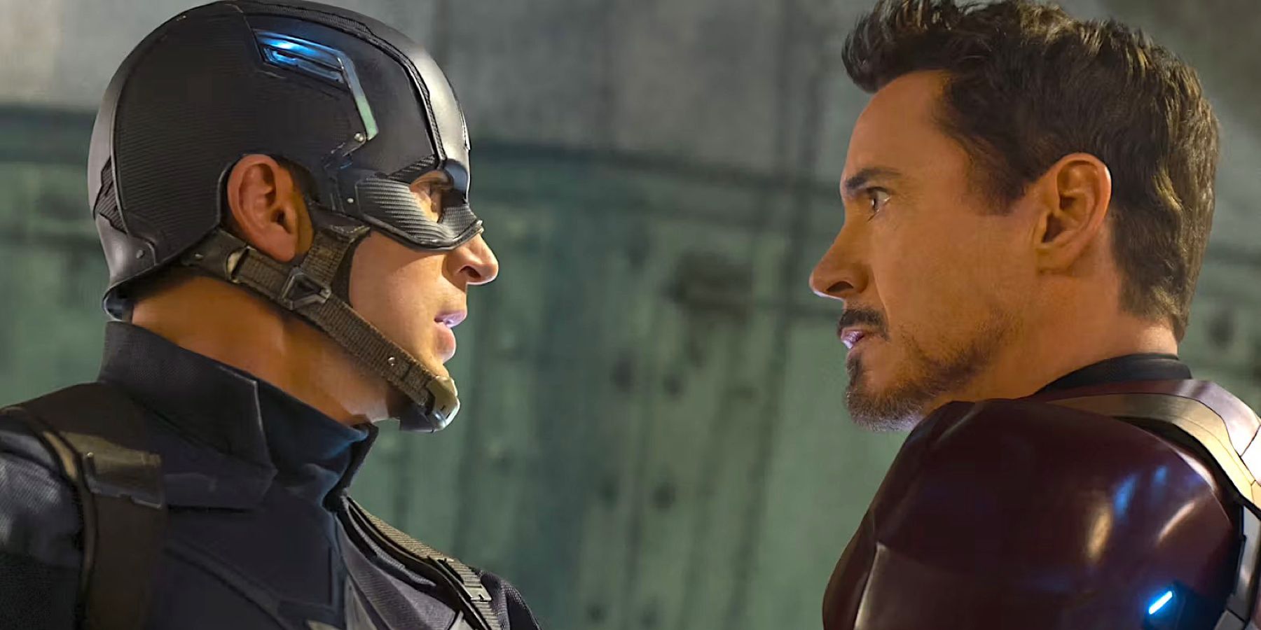 Captain America (played by actor Chris Evans), and Iron Man (played by actor Robert Downey Jr.), stare each other down menacingly in Captain America: Civil War.