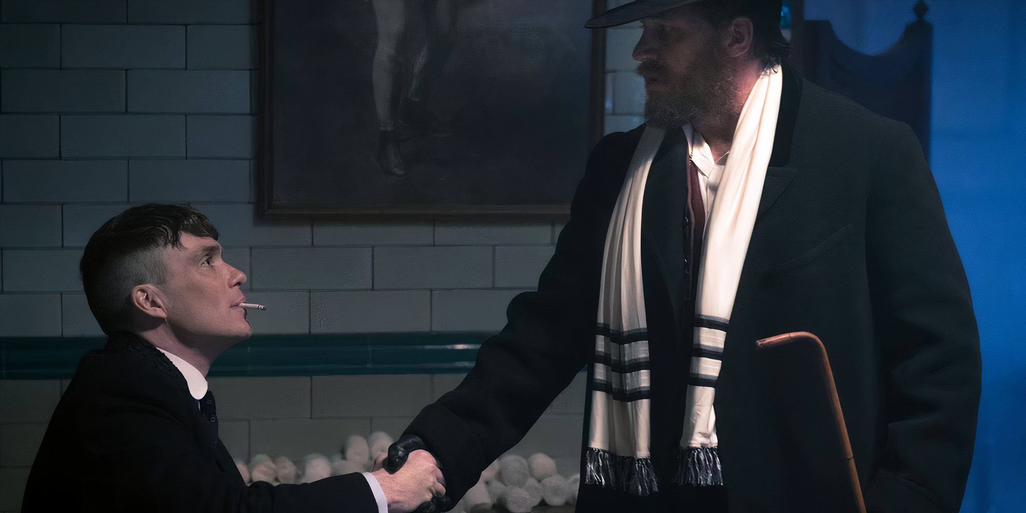 Cillian Murphy and Tom Hardy shaking hands in Peaky Blinders.