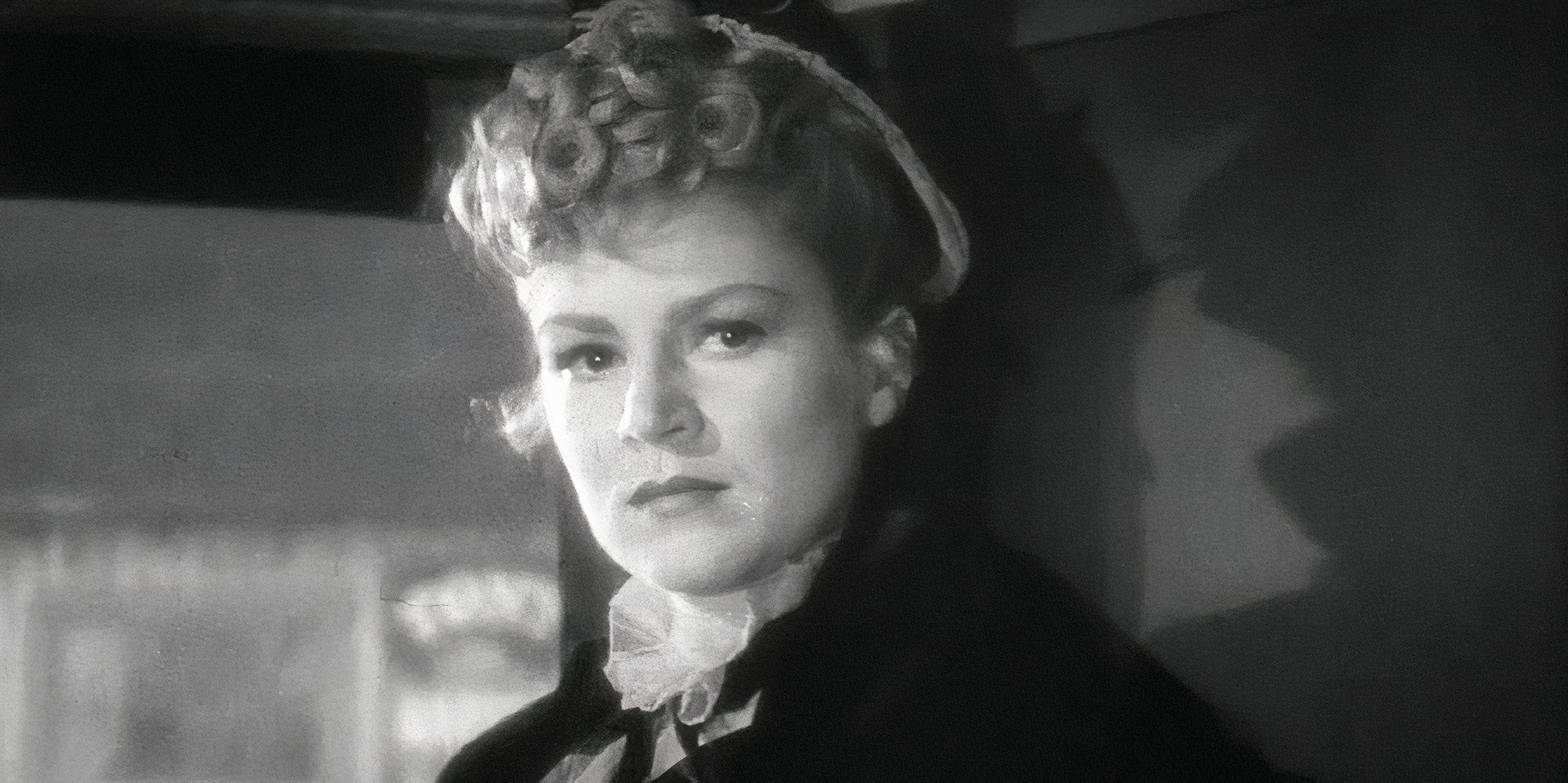 Claire Trevor in Stagecoach looking serious