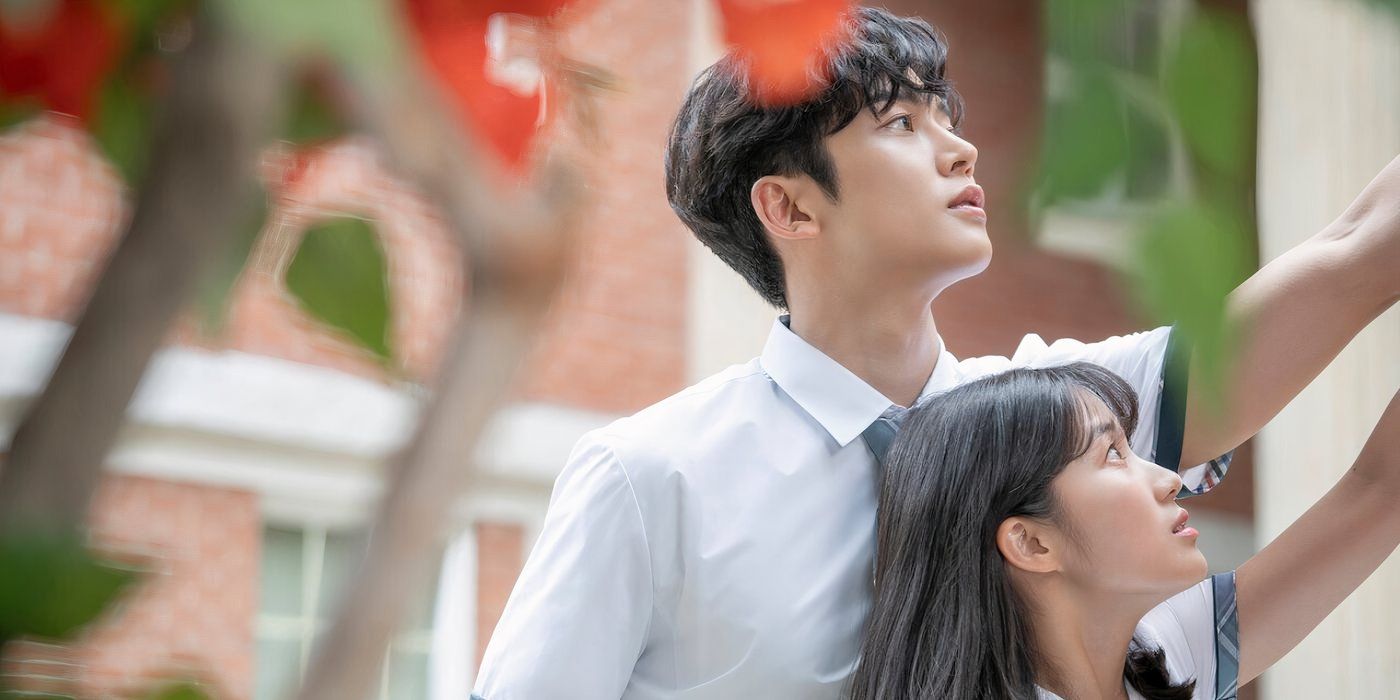 Dan Oh, played by Kim Hye Yoon, and Haru, played by Rowoon, reach to the side in Extraordinary You. 