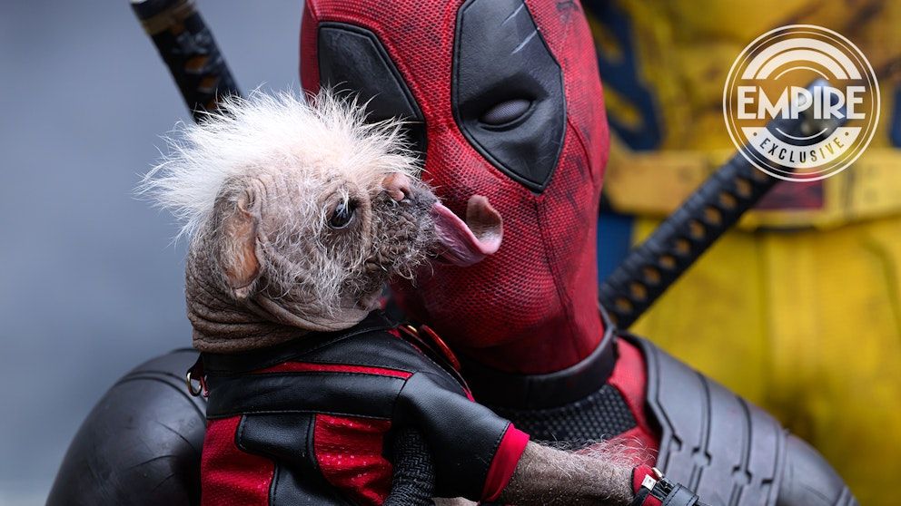 Dogpool licking Deadpool's face with Wolverine standing in the background in Deadpool & Wolverine