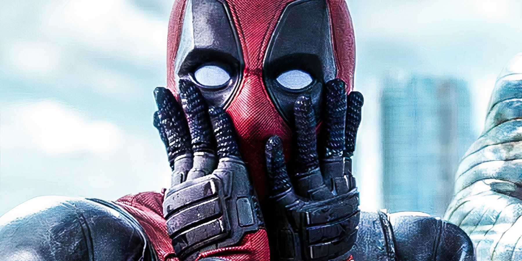 Masked vigilante Deadpool poses with his hands over his mouth in mock surprise in 2016’s ‘Deadpool.’