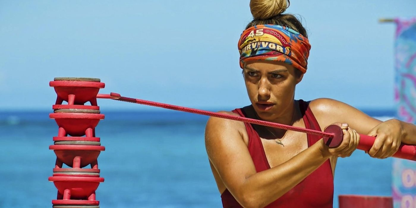 Dee Valladares tentando construir uma torre com um poste de 'Survivor 45'