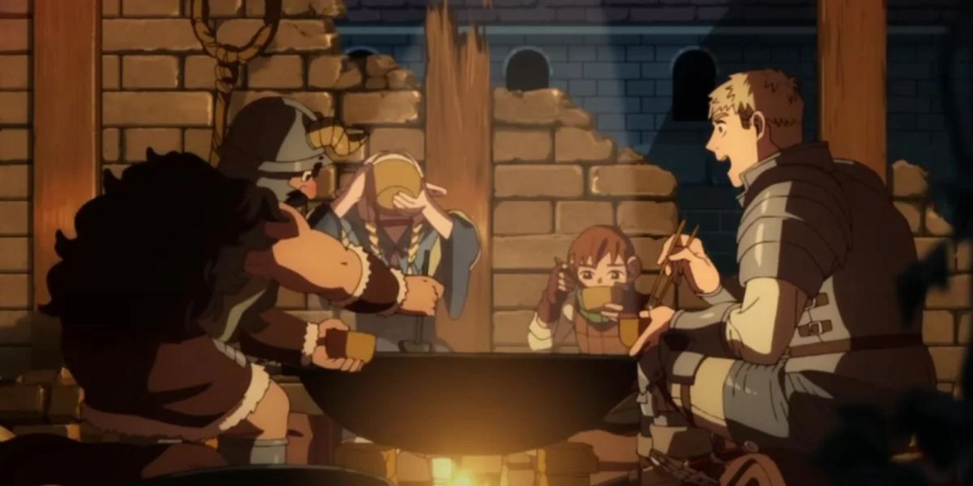 Los personajes de Delicious in Dungeon se sientan alrededor del fuego y comen juntos.